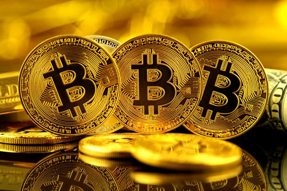 Đợt tăng kỷ lục của Bitcoin thu hút thêm tiền từ Phố Wall